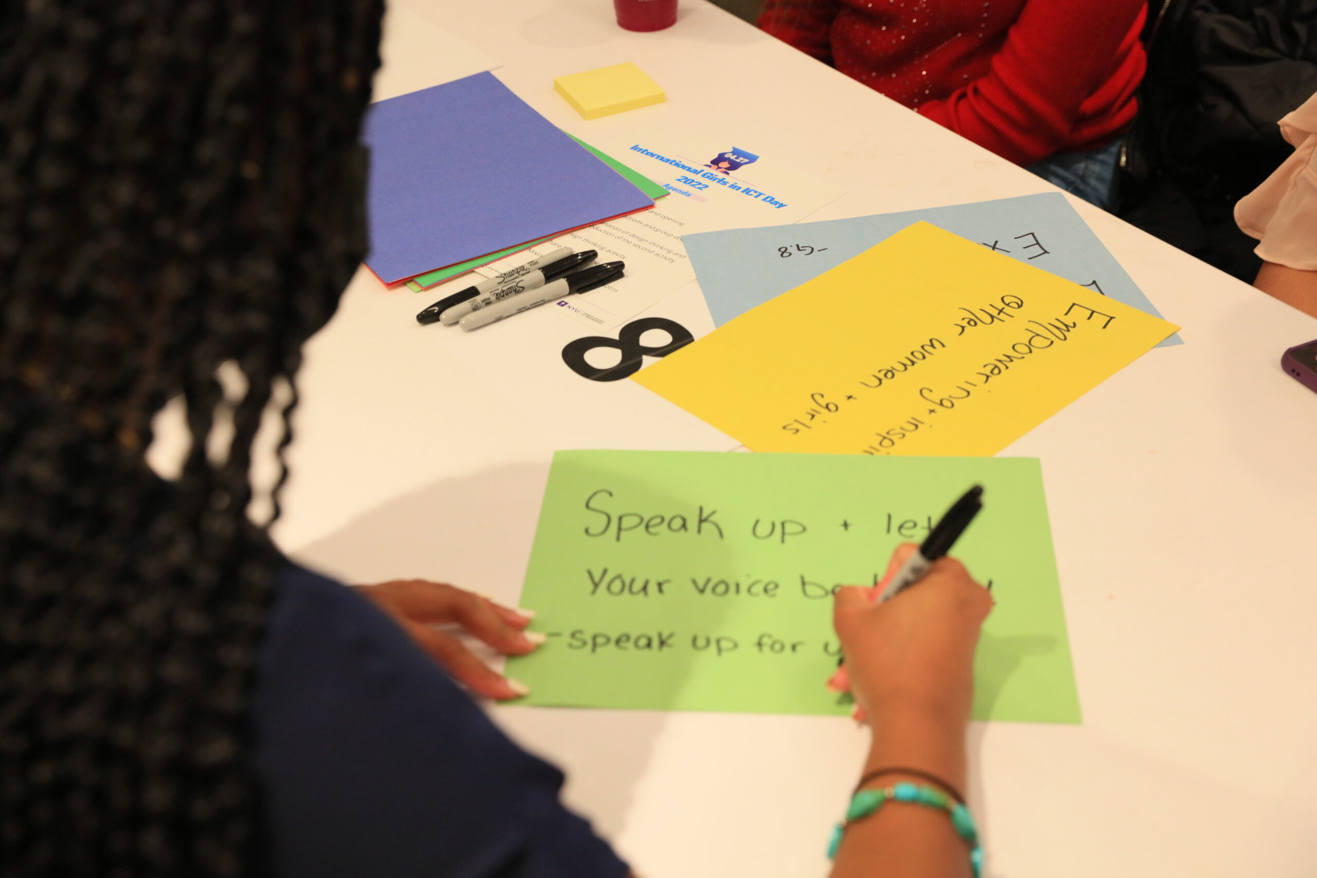 Girl participating in an activity at the International Girls in ICT Day 2022 event