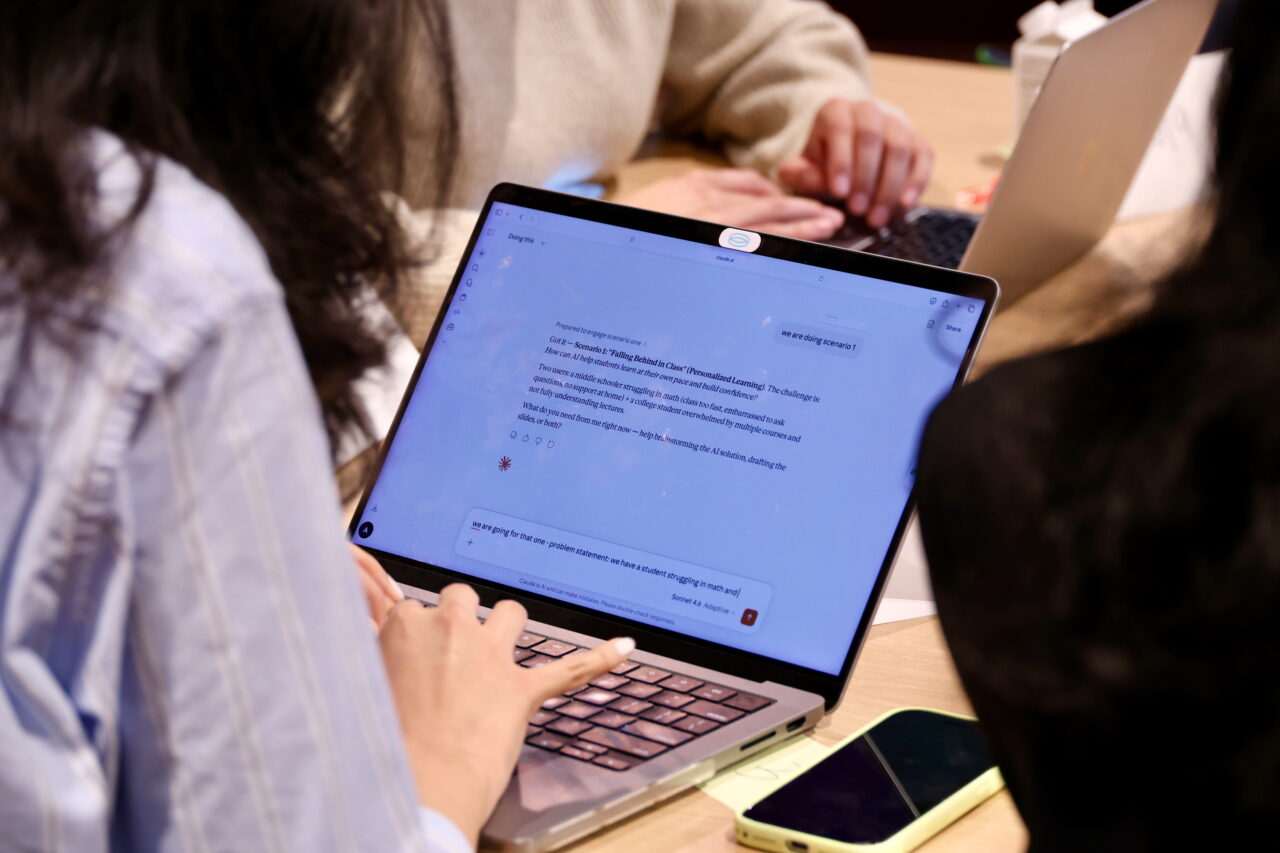 Student works with AI tool to develop the solution and prepare for the presentation.