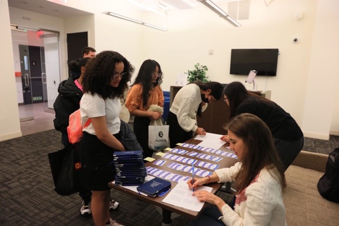 Participants being checked into the event on April 27, 2023 at Columbia University Career Design Lab.
