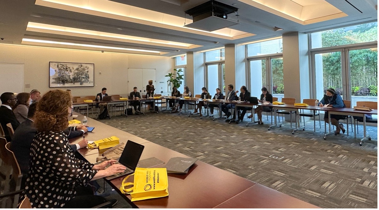 Group image of participants of UNGA 77 on conference room.